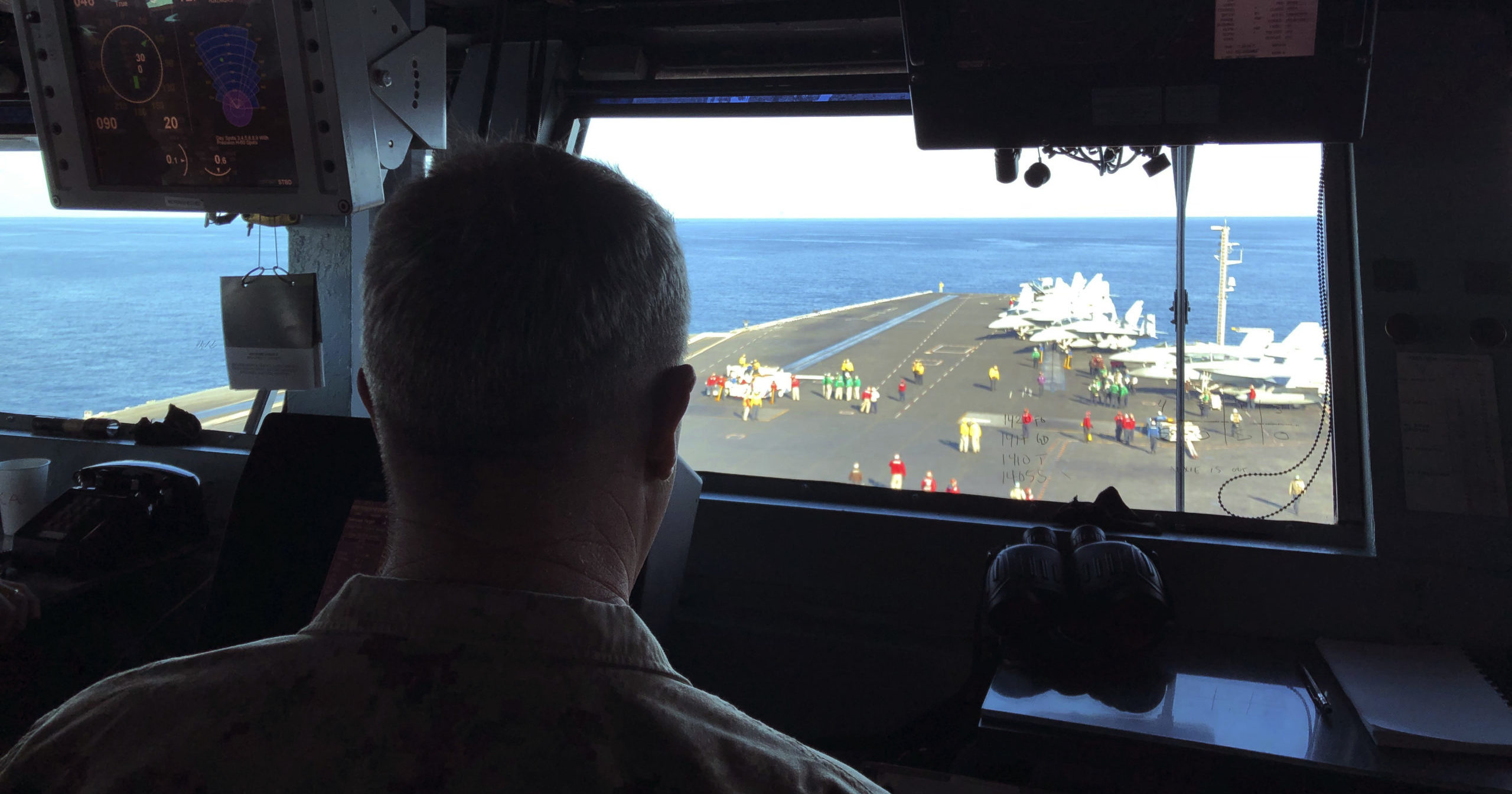 In this Feb. 1, 2020, file photo, Marine Gen. Frank McKenzie, top U.S. commander for the Middle East, watches flight operations on board the USS Harry S. Truman in the North Arabian Sea.