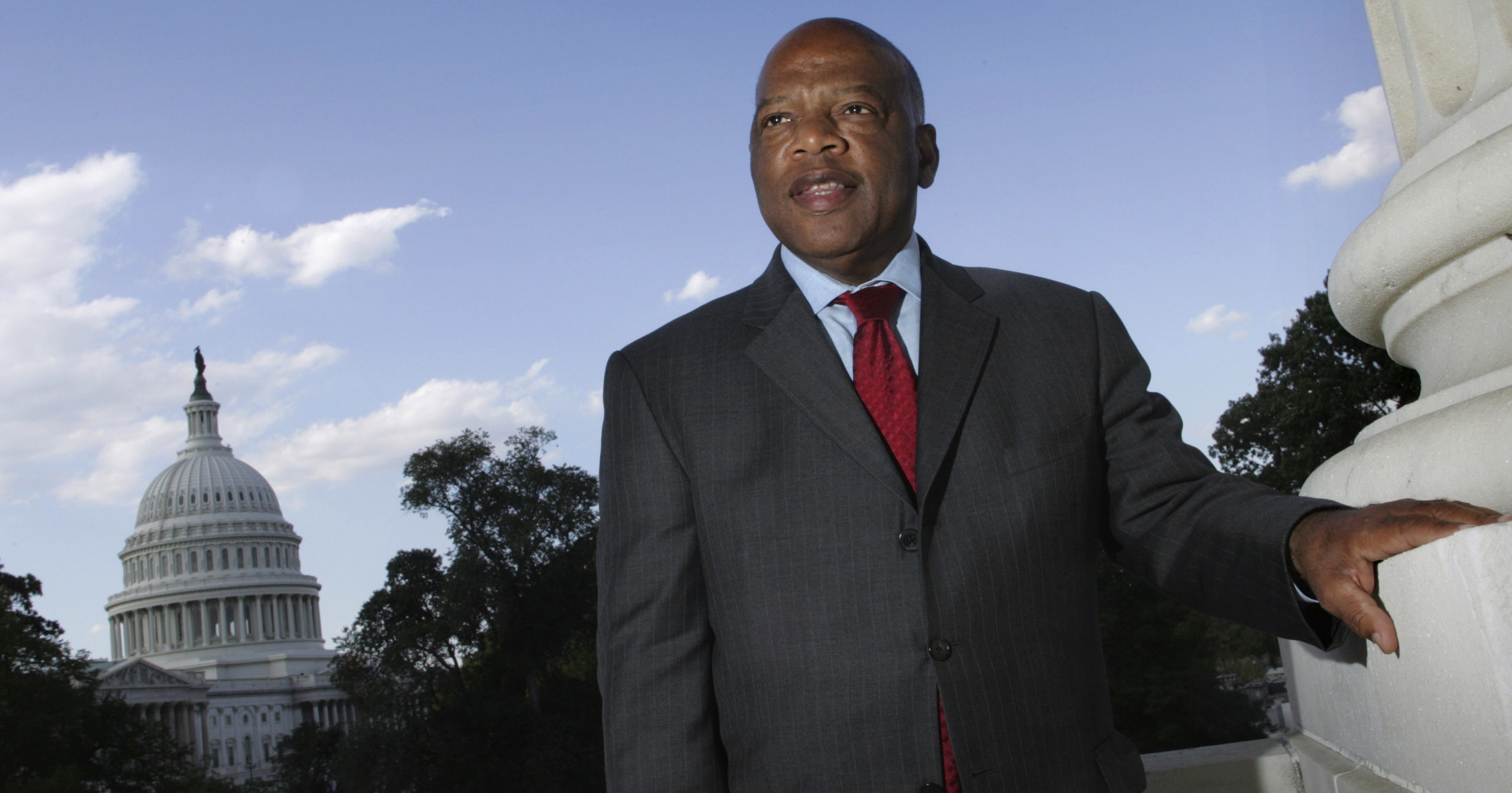 In this Oct. 10, 2007, file photo, with the Capitol Dome in the background, Georgia Democratic Rep. John Lewis is seen on Capitol Hill in Washington.