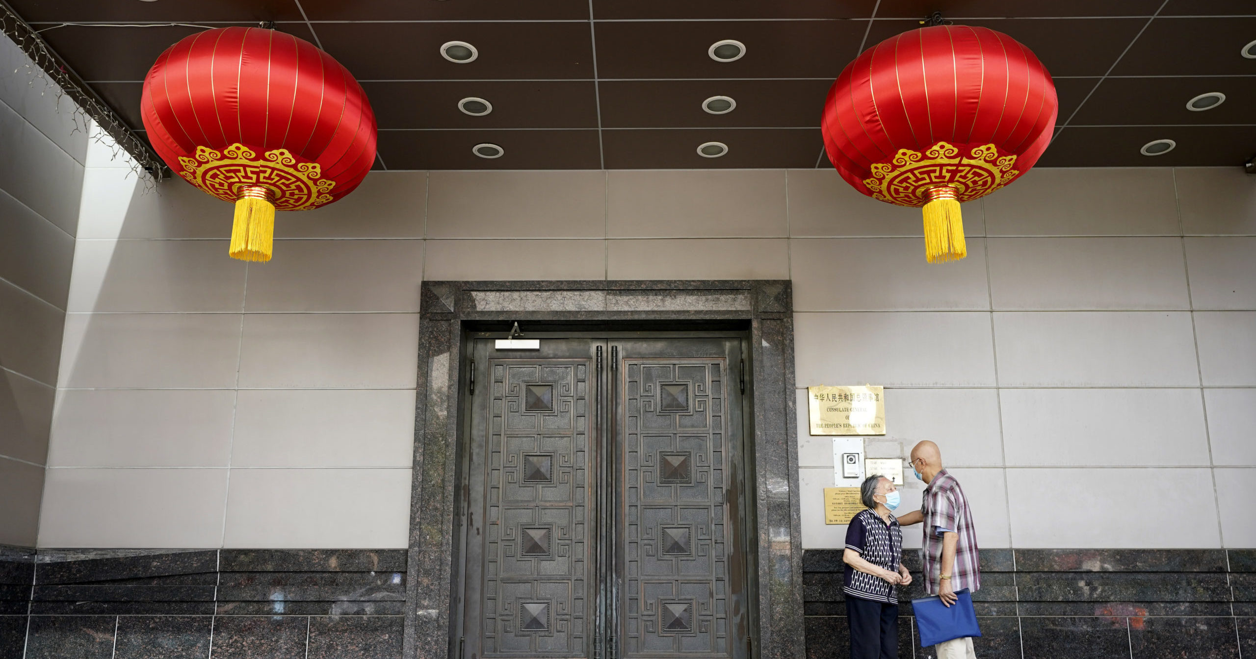 Visitors try to enter the Chinese consulate on July 22, 2020, in Houston. The U.S. has ordered the consulate to close in what China called a provocation that violates international law.