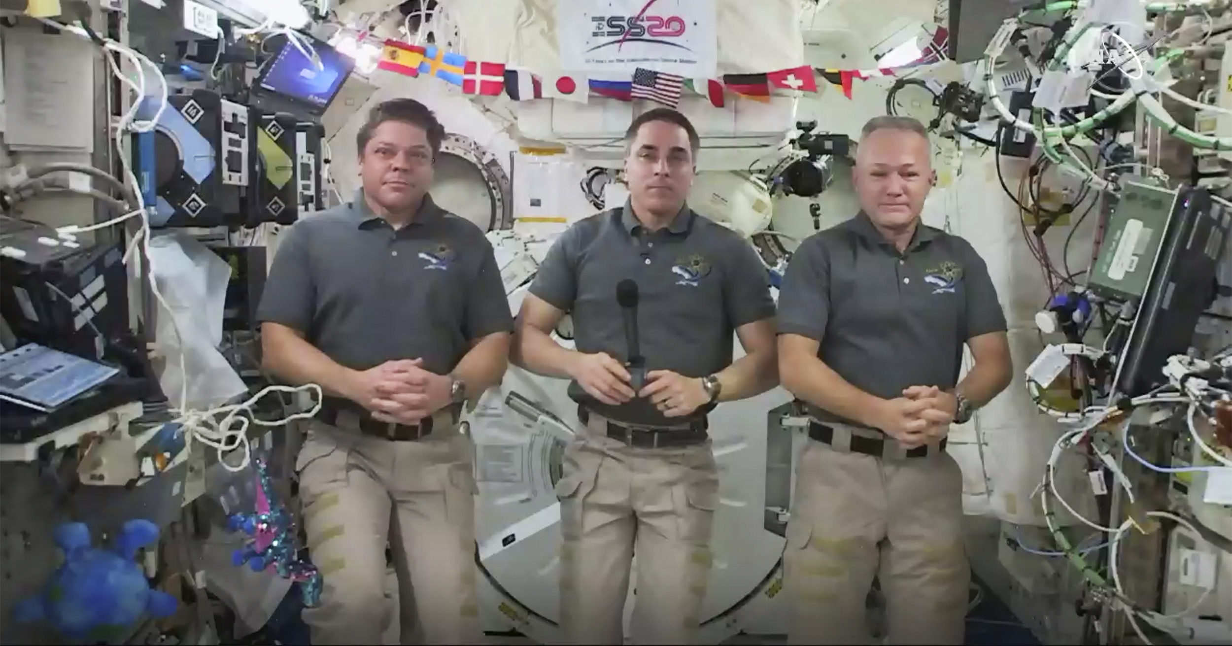 This photo provided by NASA shows, from left, astronauts Bob Behnken, Chris Cassidy and Doug Hurley during an interview on the International Space Station on July 31, 2020. Behnken and Hurley are scheduled to leave the International Space Station in a SpaceX capsule on Aug. 1 and splashdown off the coast of Florida on Aug. 2.