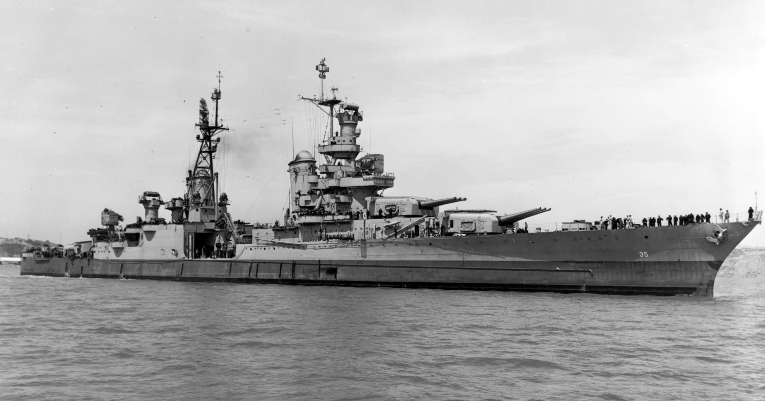 In this July 10, 1945, photo provided by U.S. Navy, the USS Indianapolis is seen off the Mare Island Navy Yard in Northern California. Congress has awarded the Congressional Gold Medal, its highest honor, to crew members of the ship that delivered key components of the first nuclear bomb and was later sunk by Japan during World War II.