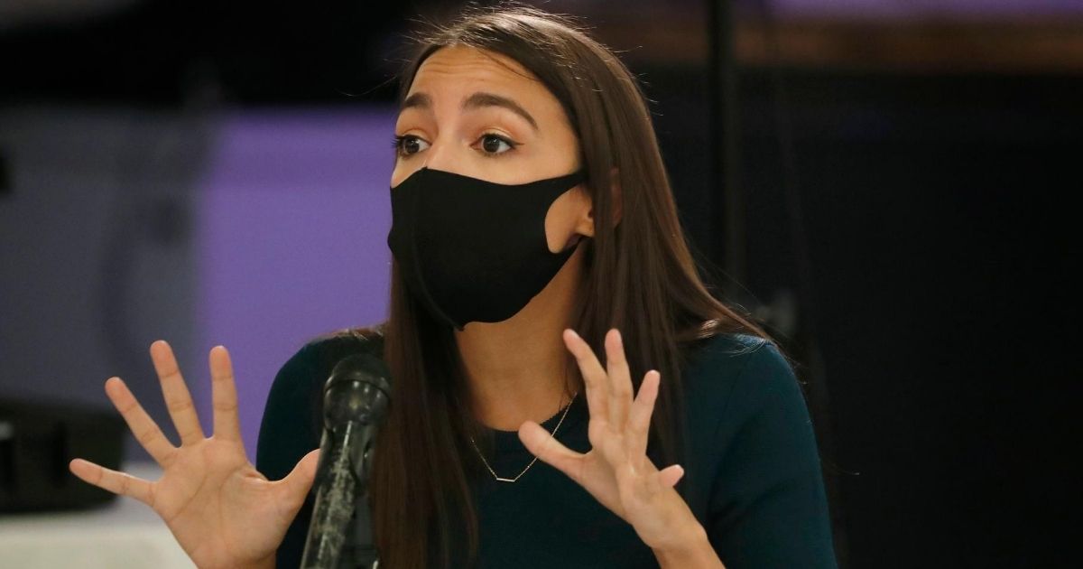 New York Democratic Rep. Alexandria Ocasio-Cortez makes a point during a debate against opponent Michelle Caruso-Cabrera ahead of New York's June 23 primary on June 17, 2020, in the Bronx borough of New York.