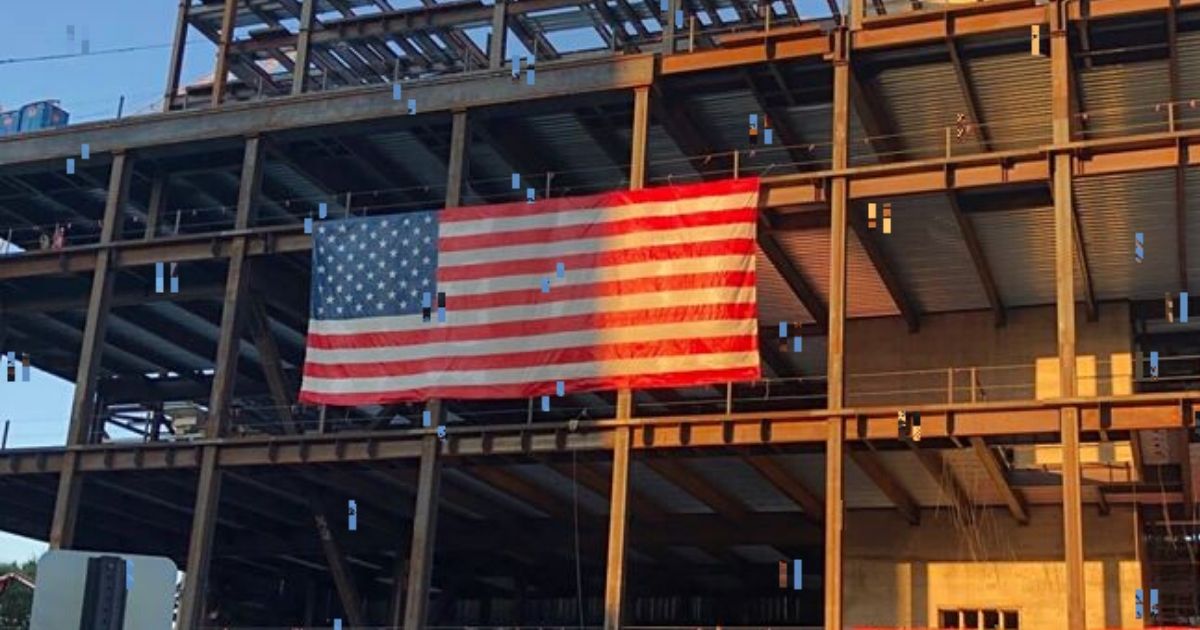 Ultimately, the Gilbane Building Company, the general contractor at the construction site where the flag was hung, complied with the request to take it down.