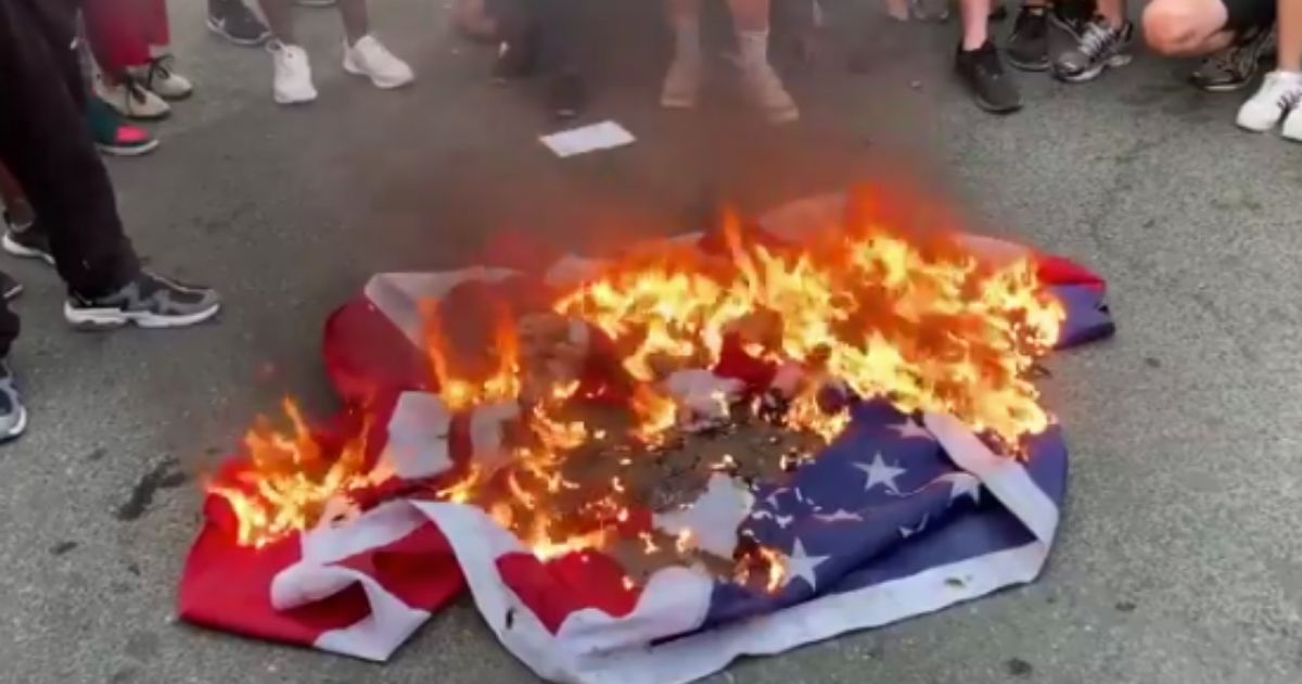 Flag on fire.