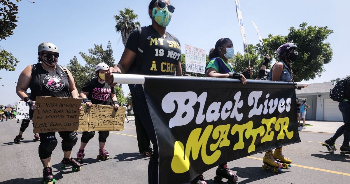 Demonstrators skate at a rolling protest in support of the Black Lives Matter movement on June 27, 2020, in Los Angeles, California.