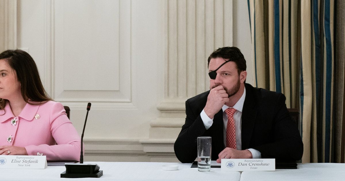 Rep. Dan Crenshaw meets with Republican Congress members in the State Dining Room at the White House on May 8, 2020.