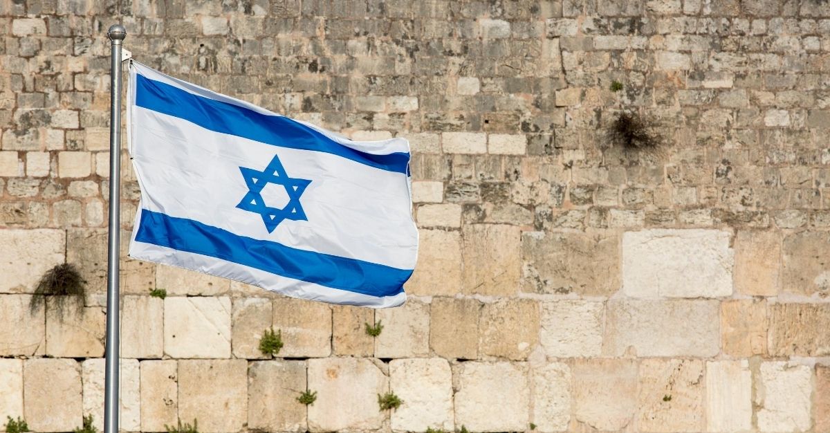 The Israeli flag flies over the Western Wall in Jerusalem, as seen above.