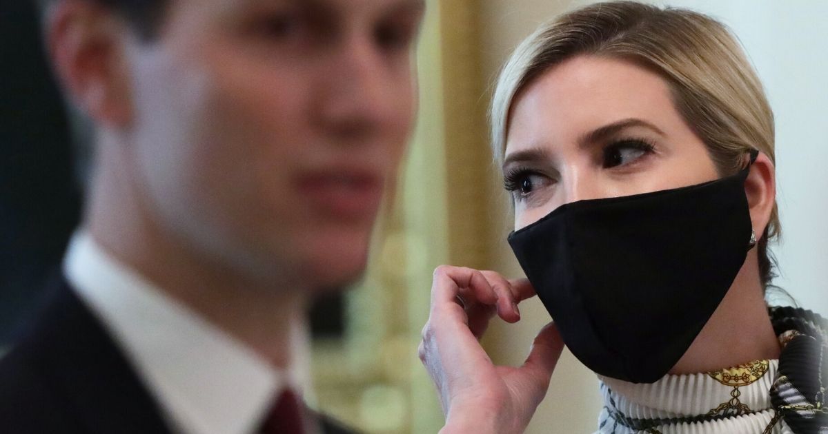 Ivanka Trump and her husband wait for the beginning of a cabinet meeting in the East Room of the White House on May 19, 2020, in Washington, D.C.