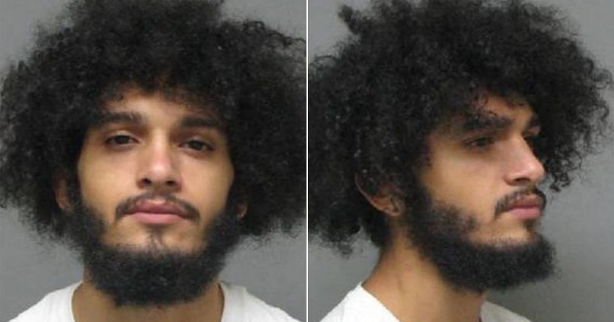 Isaiah Jackson, 20, has been booked into an Ohio jail on a probation violation after it's alleged he was the man in a photo putting his knee on the neck of a white toddler, in tears, with the caption "Blm now mf."