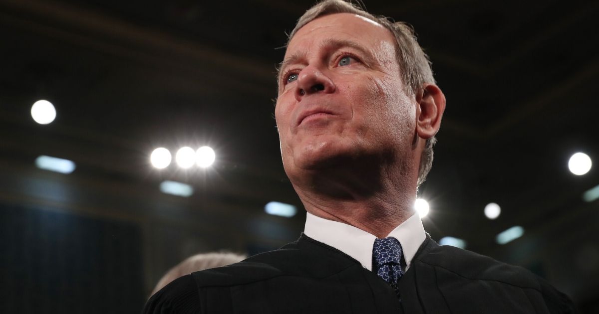 Supreme Court Chief Justice John Roberts awaits the arrival of President Donald Trump in the House chamber on Feb. 4, 2020, in Washington, D.C.