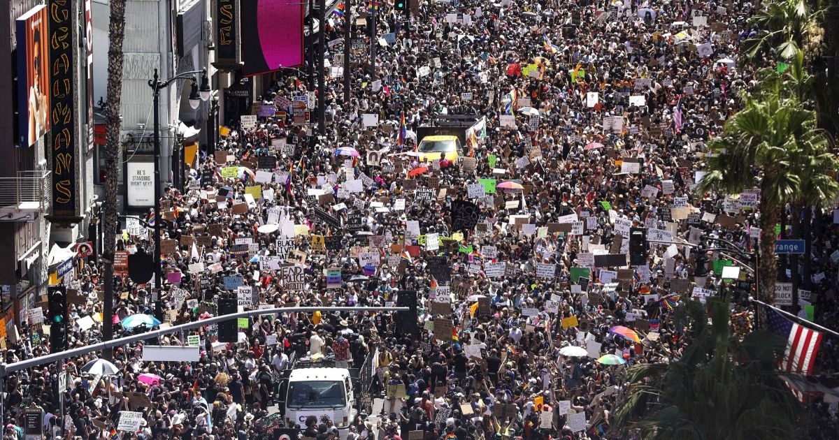 Massive crowds gather on Hollywood Boulevard in Los Angeles for the All Black Lives Matter rally June 14, 2020.