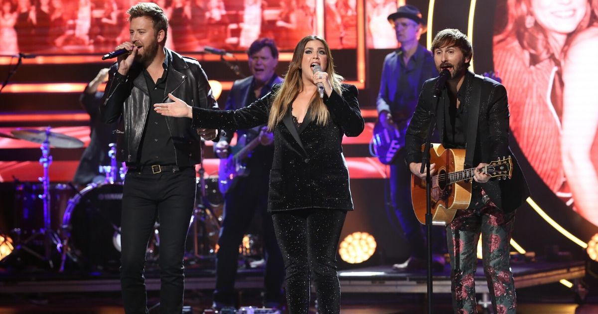 From left to right, Charles Kelley, Hillary Scott and Dave Haywood of Lady Antebellum perform onstage at Schermerhorn Symphony Center on Oct. 16, 2019, in Nashville, Tennessee.