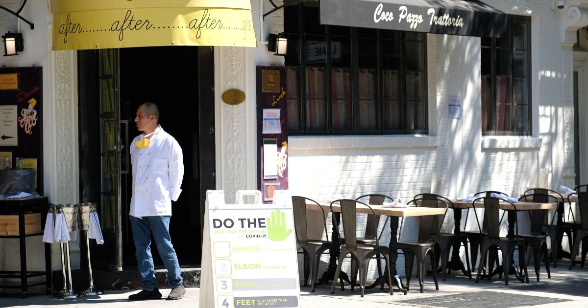 A restaurant in the SoHo neighborhood of New York's Manhattan borough has plenty of sidewalk tables available June 22, 2020.
