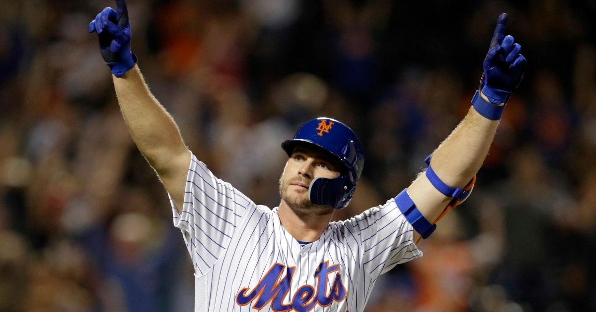 In this Sept. 28, 2019, file photo, New York Mets hitter Pete Alonso reacts after hitting his 53rd home run of the season during the third inning of a baseball game against the Atlanta Braves in New York.