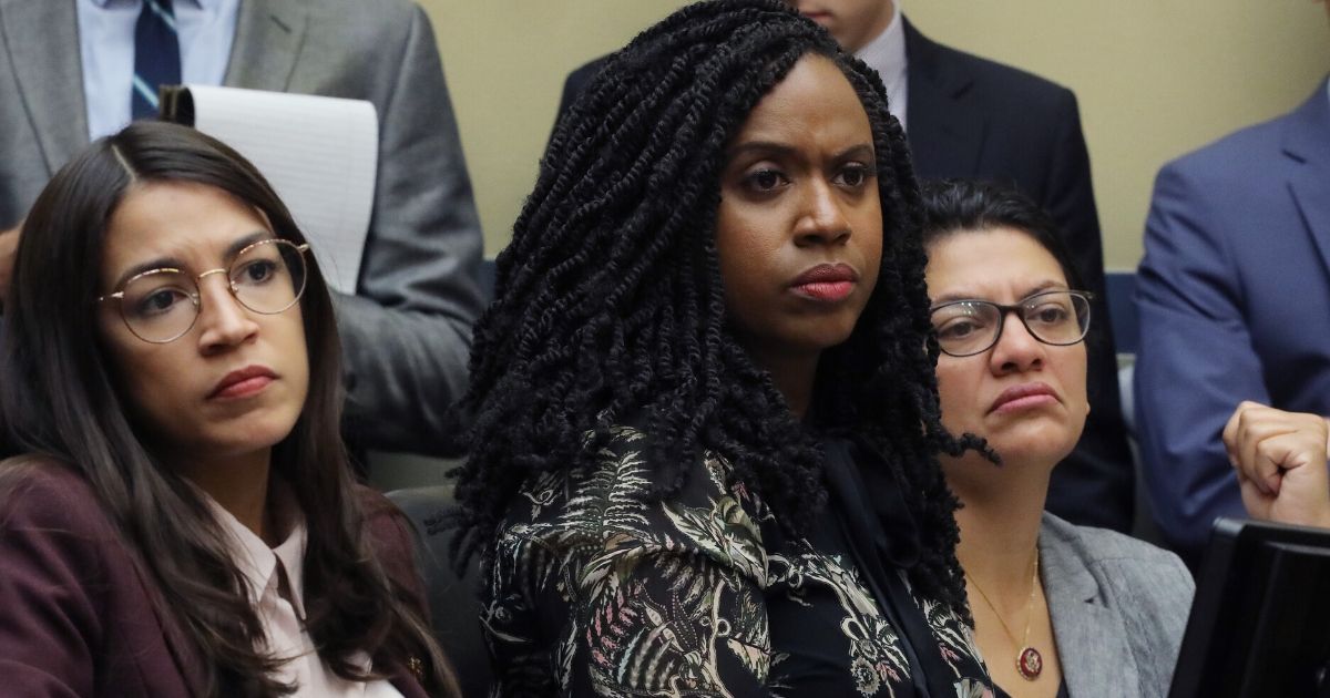 From left, Democratic Reps. Alexandria Ocasio-Cortez of New York, Ayanna Pressley of Massachusetts and Rashida Tlaib of Michigan attend a hearing in the Rayburn House Office Building on Capitol Hill in Washington on July 26, 2019.