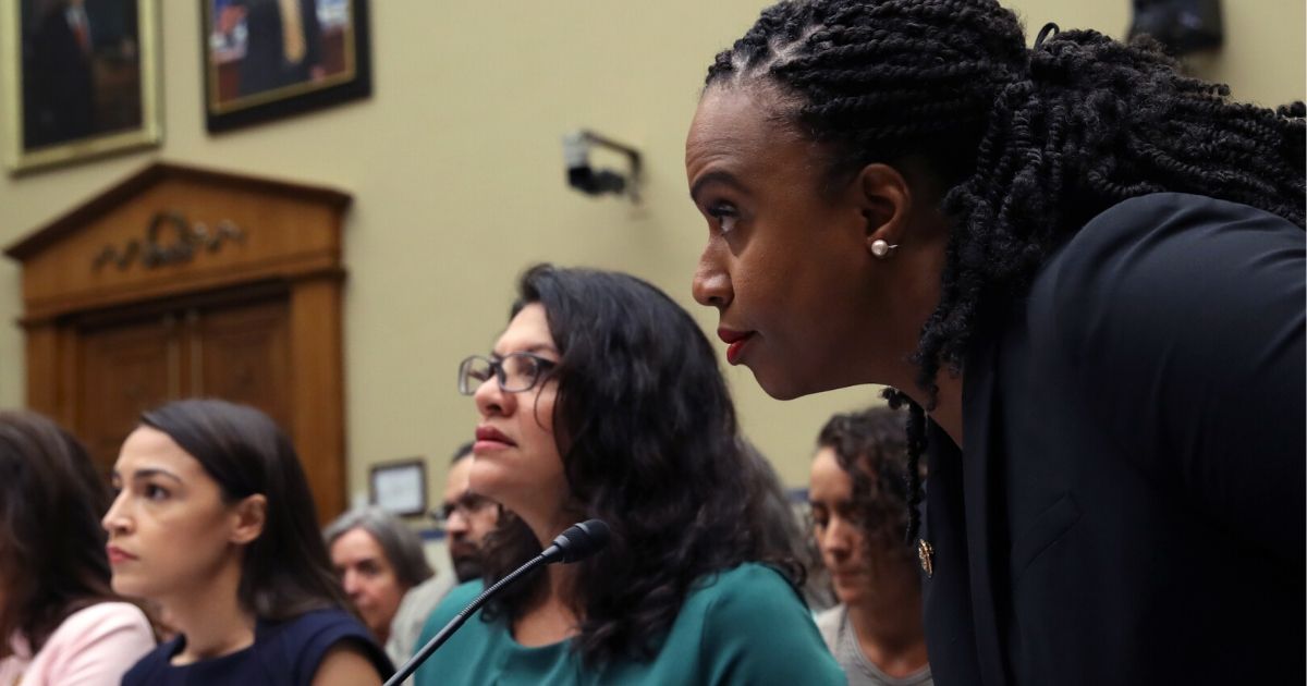From left, Democratic Reps. Alexandria Ocasio-Cortez of New York, Rashida Tlaib of Michigan and Ayanna Pressley of Massachusetts attend a House Oversight and Reform Committee hearing in Washington on July 12, 2019.