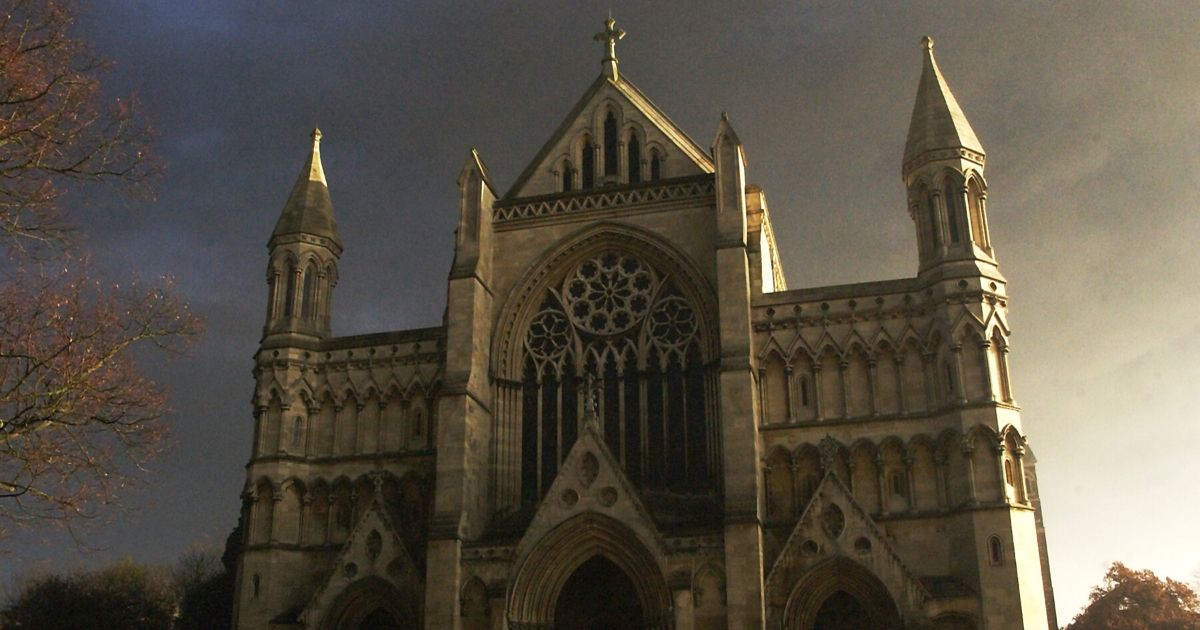 Smoke drifts past the spires of St Albans Cathedral