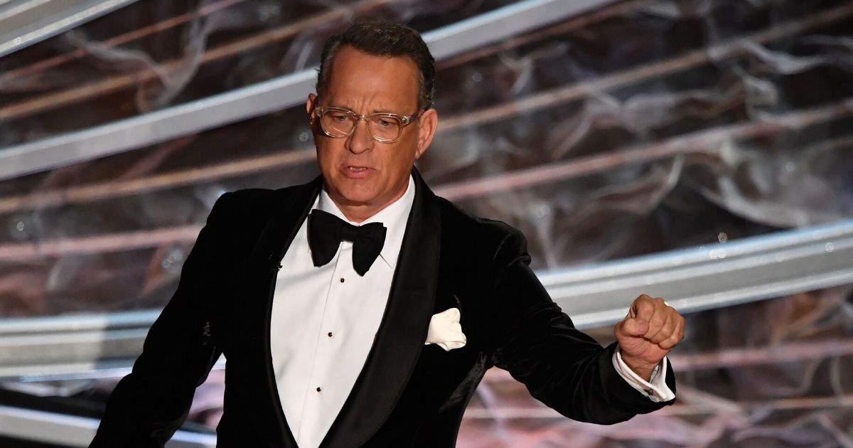 Actor Tom Hanks walks onstage during the 92nd Oscars at the Dolby Theatre in Hollywood, California, on Feb. 9, 2020.