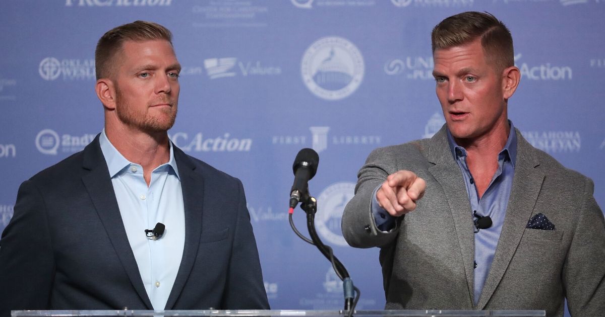 Twin brothers David and Jason Benham address the Values Voter Summit in Washington, D.C., in 2016. The event, hosted by the Family Research Council, is an annual gathering of social and political conservatives.
