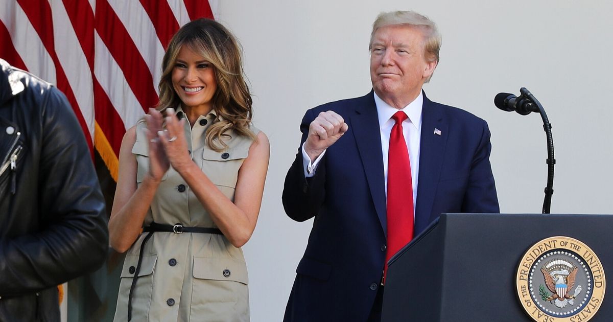 President Donald Trump and first lady Melania Trump are pictured in the White House Rose Garde in a May file photo.