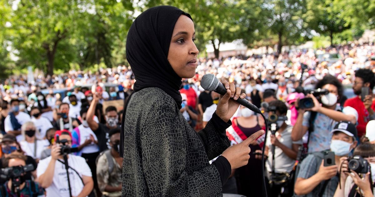 Rep. Ilhan Omar speaks to a crowd gathered for a march to defund the Minneapolis Police Department on June 6 in Minneapolis.