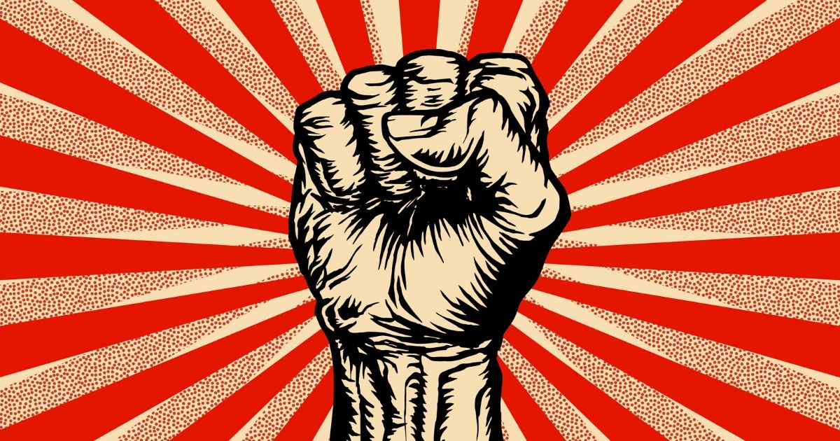 An illustration of the Marxist symbol of a raised fist.