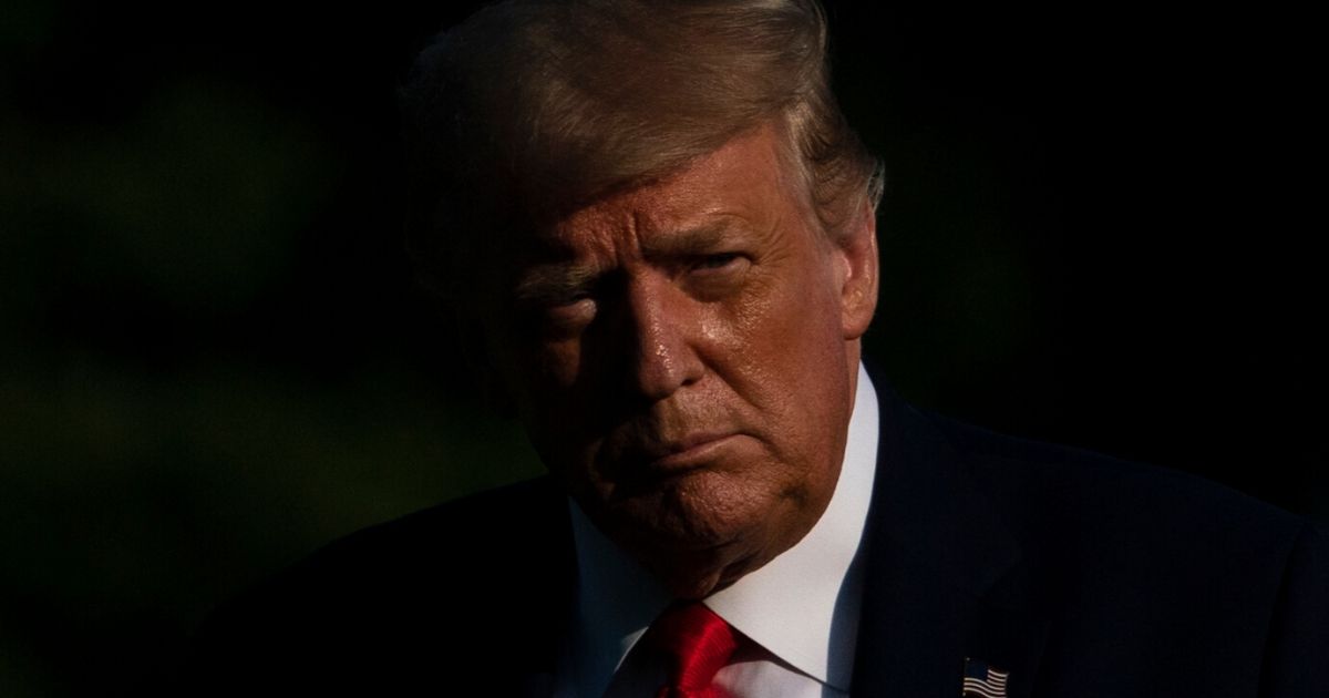 President Donald Trump walks to the White House residence after exiting Marine One on the South Lawn of the White House on July 15, 2020, in Washington, D.C.