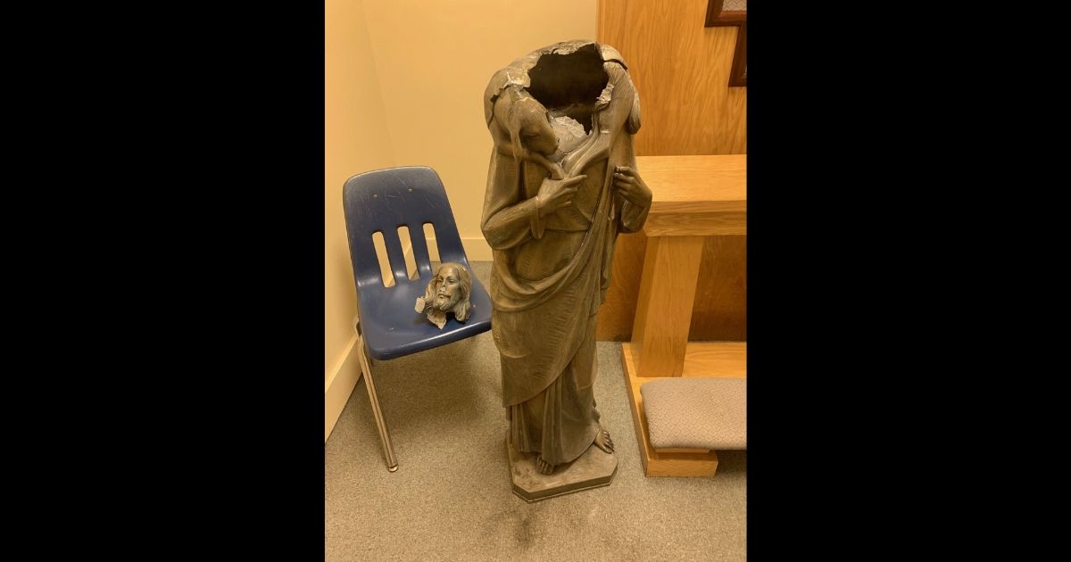 A statue of Jesus that was discovered beheaded and knocked off its pedestal on the grounds of the Good Shepherd Catholic Church in Miami.