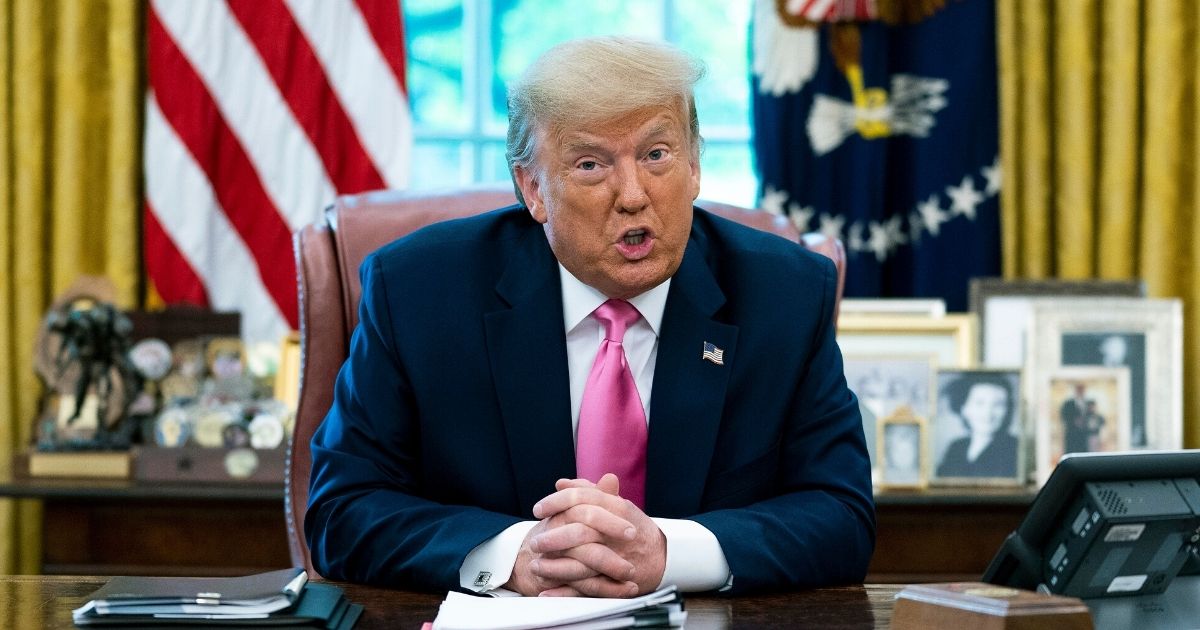 President Donald Trump talks to reporters while hosting Republican congressional leaders and members of his cabinet in the Oval Office at the White House on July 20, 2020, in Washington, D.C.