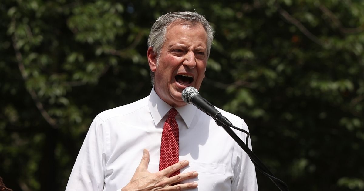 New York Mayor Bill de Blasio speaks to an estimated 10,000 people as they gather in Brooklyn’s Cadman Plaza Park for a memorial service for George Floyd on June 4, 2020, in New York City.