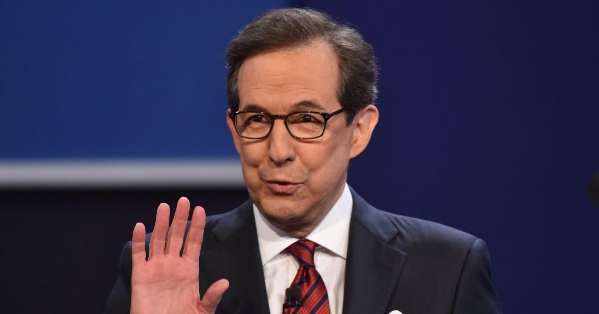 Debate moderator Chris Wallace speaks prior to the third and final presidential debate between Democratic nominee Hillary Clinton and Republican nominee Donald Trump at the Thomas & Mack Center on the campus of the University of Las Vegas in Las Vegas on Oct. 19, 2016.