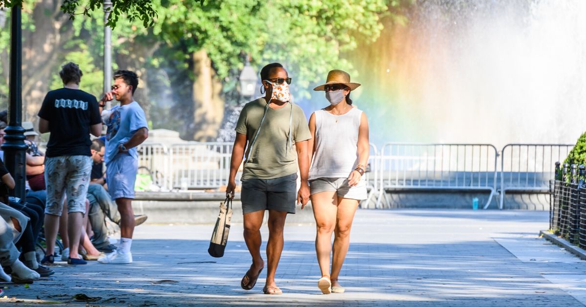 People wear masks in New York City on July 12, 2020. In Ohio, face coverings are now mandatory in seven counties.