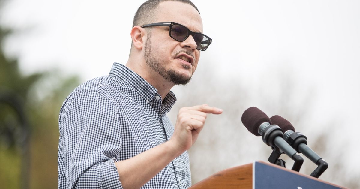 Activist Shaun King introduces Democratic presidential candidate Bernie Sanders during a rally in Montpelier, Vermont, on May 25, 2019. Churches have been targeted in America's culture wars; King has called for religious art to be destroyed.