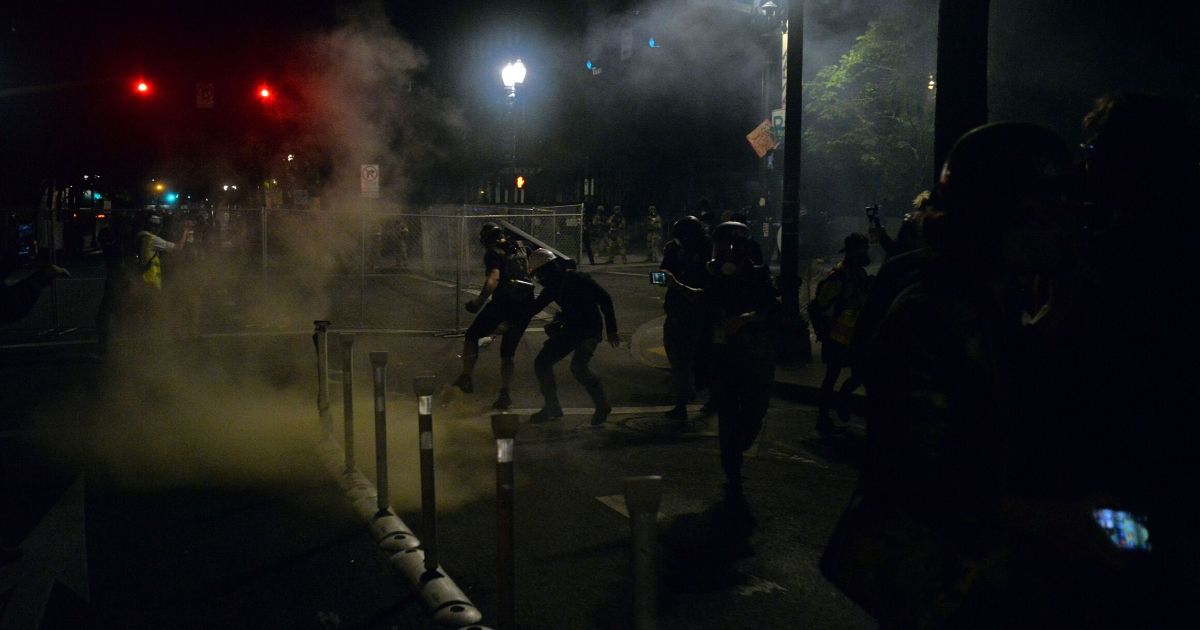 Tim Farkas 4:06 PM Federal police use CS gas and pepper spray against protesters at the Edith Green-Wendell Wyatt Federal Building in Portland, Oregon, on July 17, 2020.