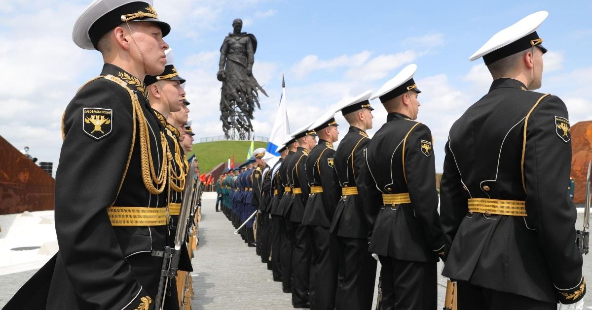 Servicemen stand in formation during a ceremony unveiling the Soviet Soldier Memorial near Rzhev on June 30, 2020.