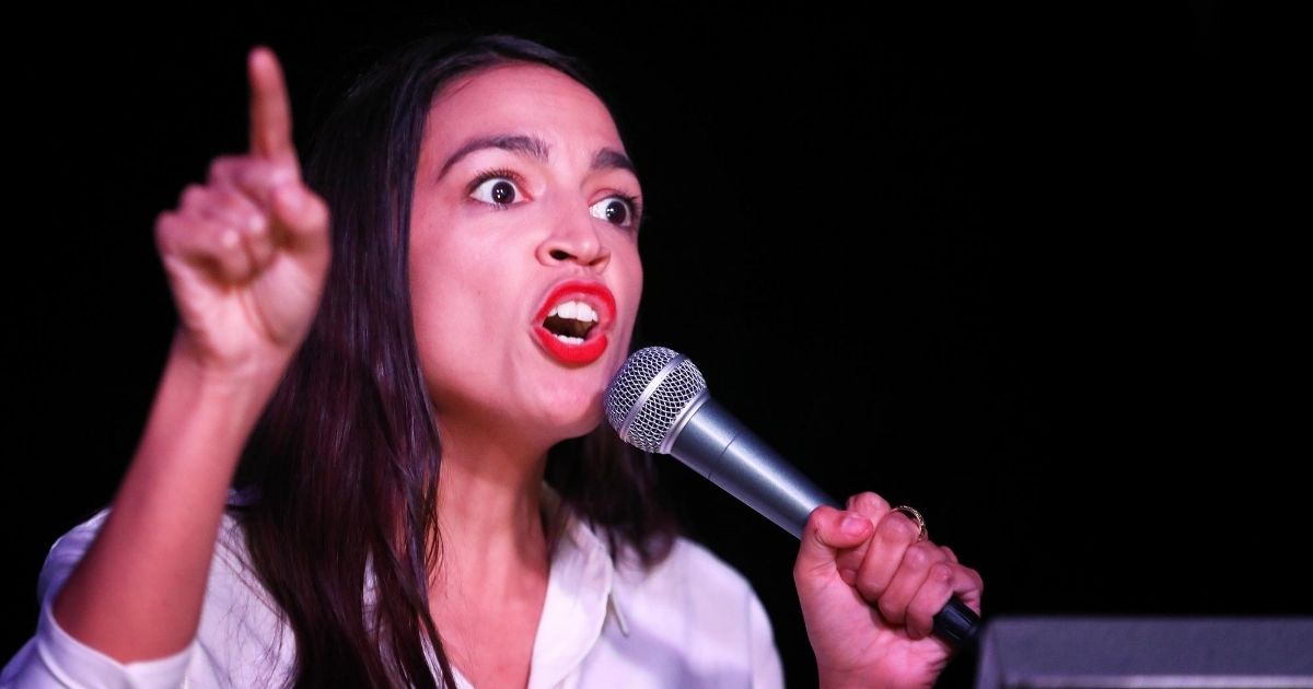 Alexandria Ocasio-Cortez addresses the crowd gathered at a night club in Queens on Nov. 6, 2018, in New York City.