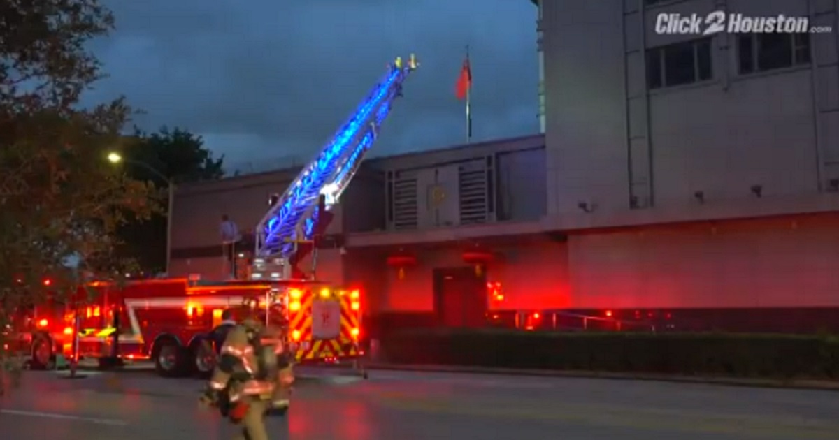 Houston firefighters and trucks outside the Chinese consulate in Houston on Tuesday.