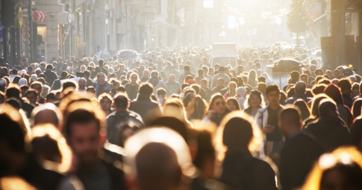 A crowd is seen in this stock image.