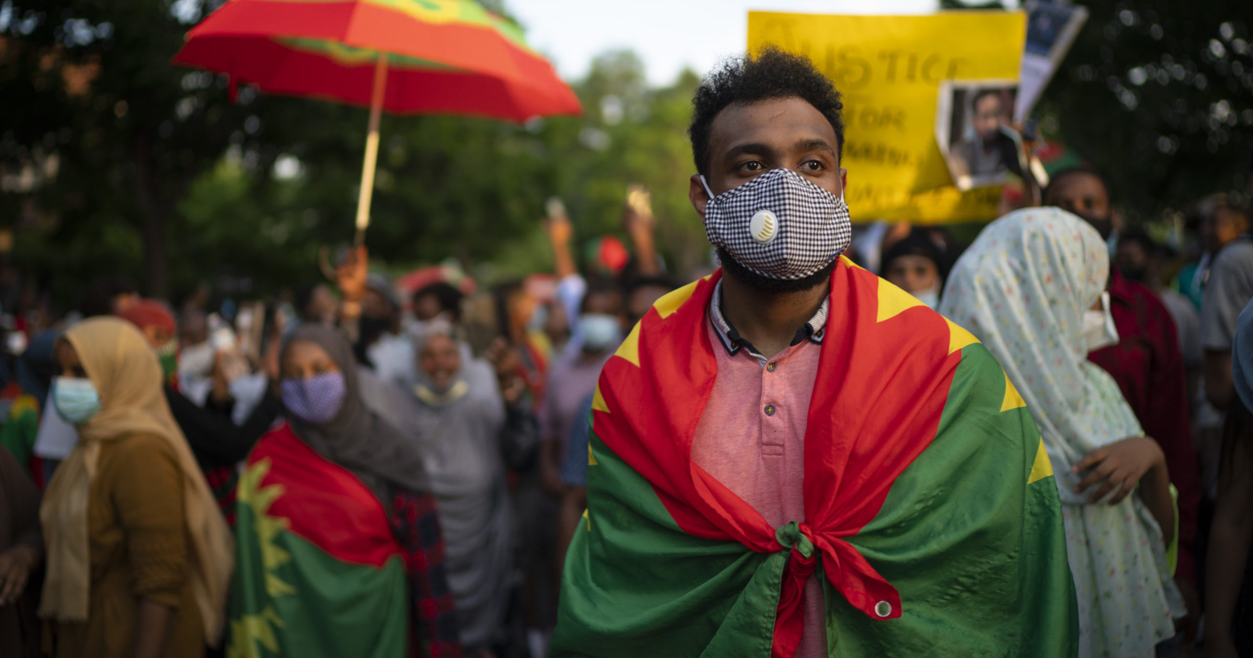 In this July 1, 2020, file photo, protesters outraged by the killing of popular Ethiopian singer Hachalu Hundessa march in St. Paul, Minnesota. Ethiopian officials said on July 8 that at least 239 people have been killed and 3,500 arrested in a week of unrest in Ethiopia.