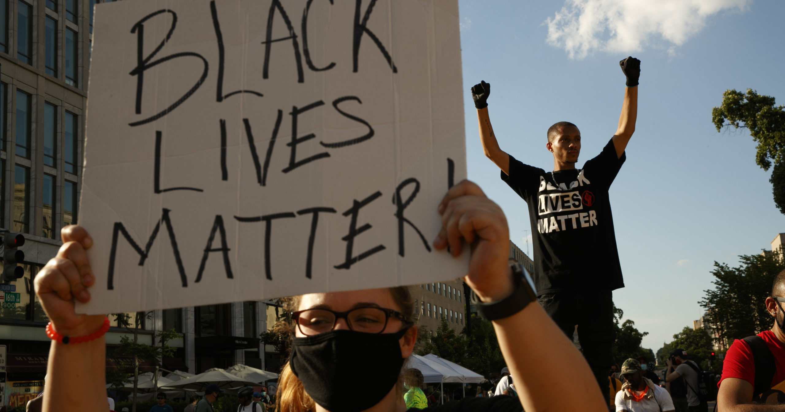 In this June 24, 2020, file photo, demonstrators protest on a section of 16th Street that's been renamed Black Lives Matter Plaza, in Washington.