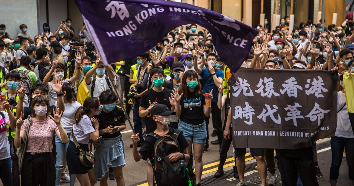 Demonstrators take part in a protest against a new Chinese national security law on July 1, 2020, in Hong Kong, China.