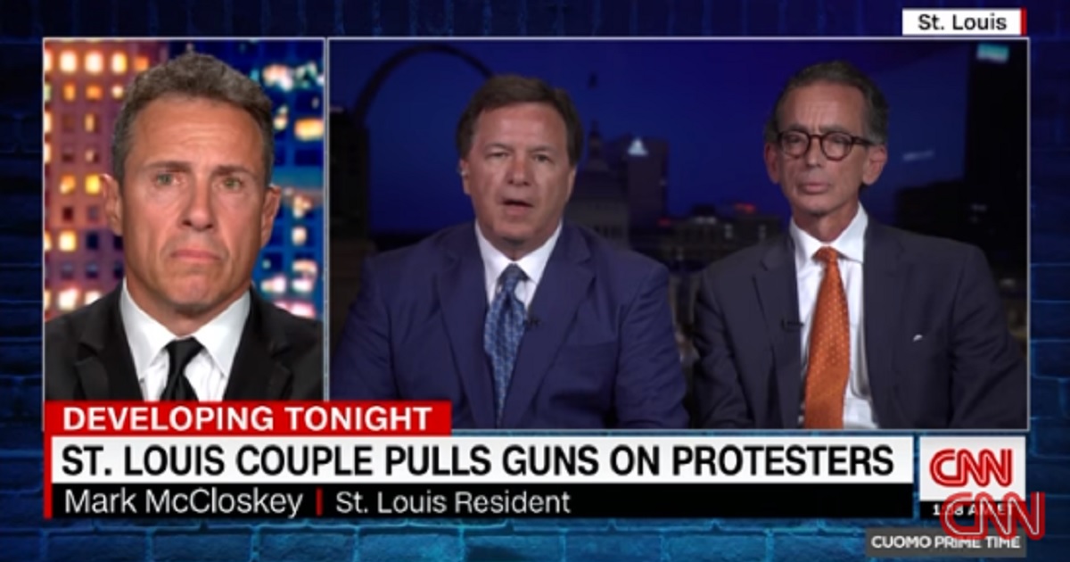 CNN's Chris Cuomo intervews St. Louis homeowner Mark McCloskey, center, and McCloskey attorney Albert Watkins, right, on "Cuomo Prime Time" Tuesday.