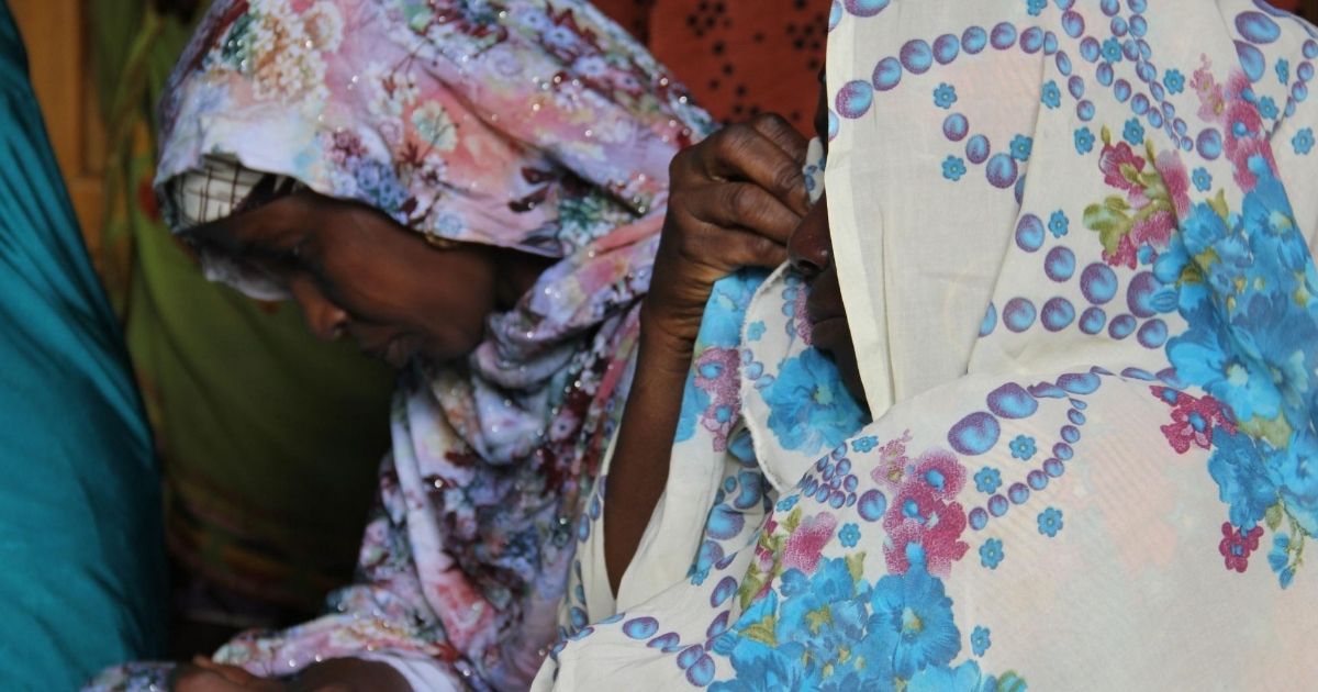 The family of one of the five aid workers abducted last month by jihadists gathers to mourn the death of their relative in Maiduguri on July 23, 2020. Insurgents tied to the Islamic State group released a video online purporting to show the execution of the Nigerian humanitarians.