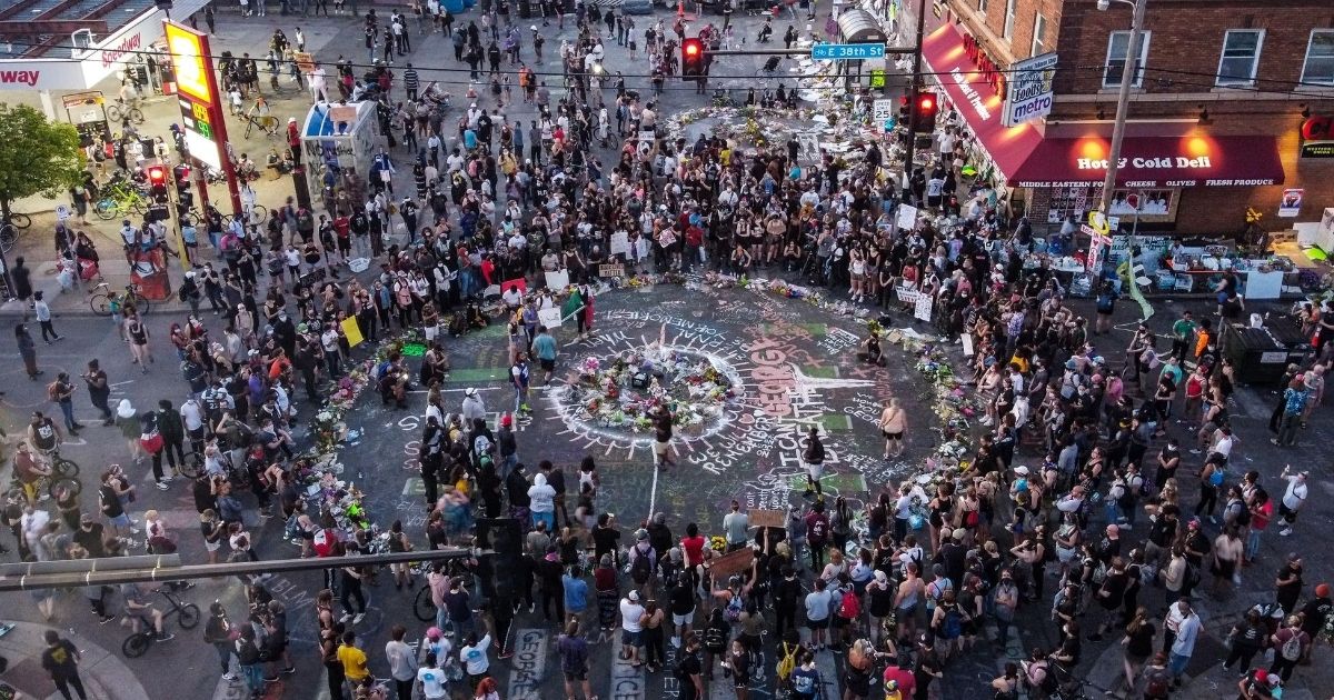 Protesters gather near the makeshift memorial in honor of George Floyd on June 1, 2020, in Minneapolis, Minnesota.