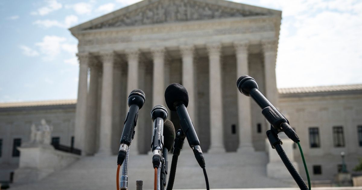 A set of microphones stand outside of the U.S. Supreme Court on July 6, 2020, in Washington, D.C.
