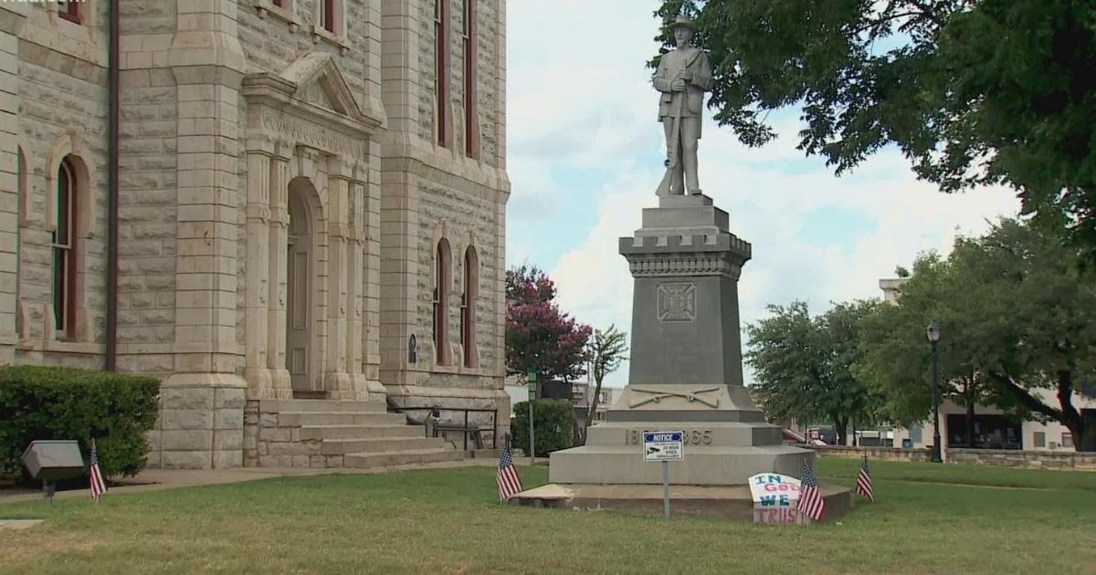 A statue of a Confederate soldier stands outside a courthouse in Parker County, Texas. The county commissioners voted unanimously to keep the statue on July 30, 2020.