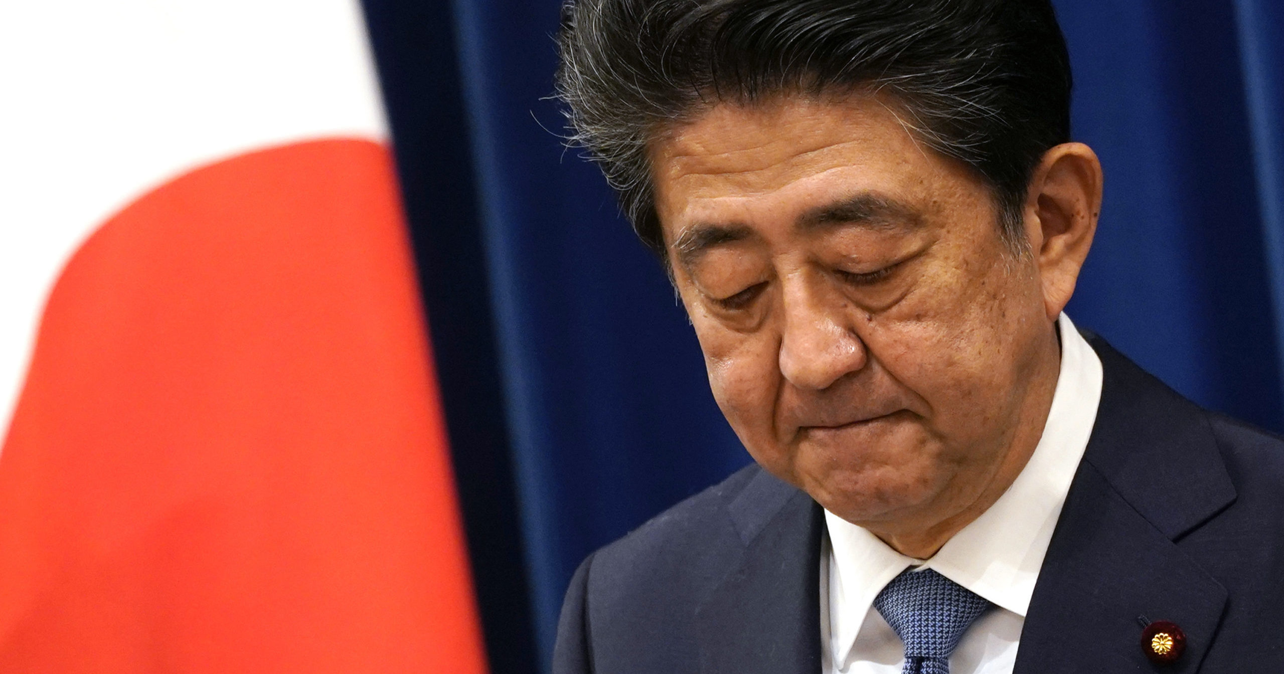Japanese Prime Minister Shinzo Abe speaks during a news conference in Tokyo on Aug. 28, 2020. Abe, Japan’s longest-serving prime minister, says he’s resigning because a chronic illness has resurfaced.