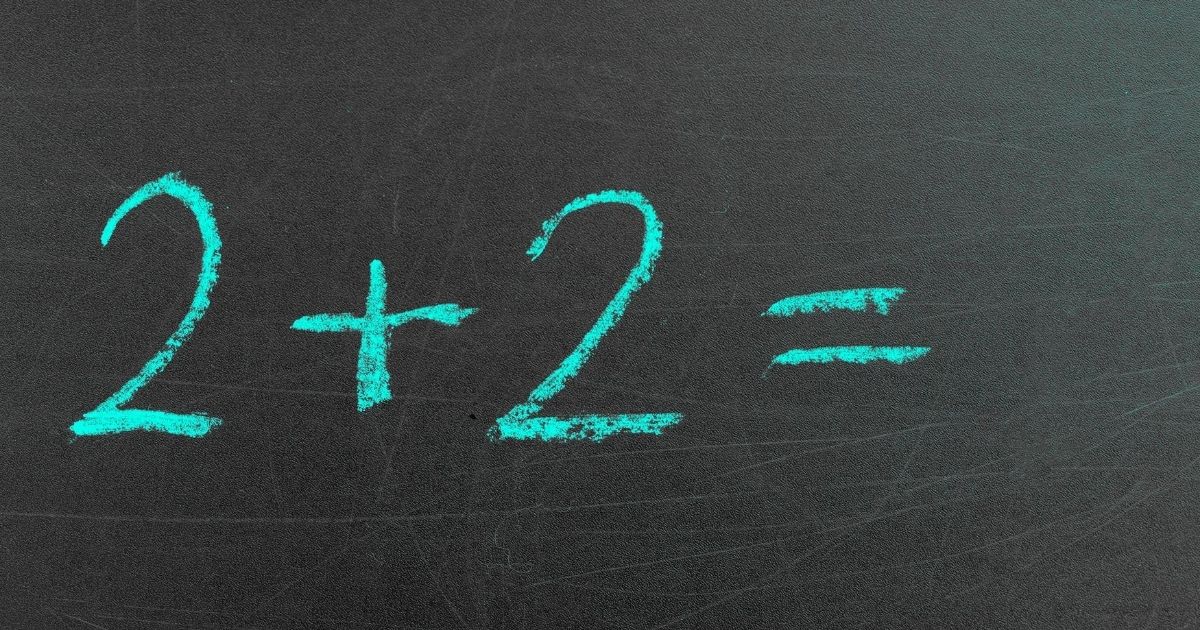 The simple mathematical equation 2 + 2 is seen in the stock image above.