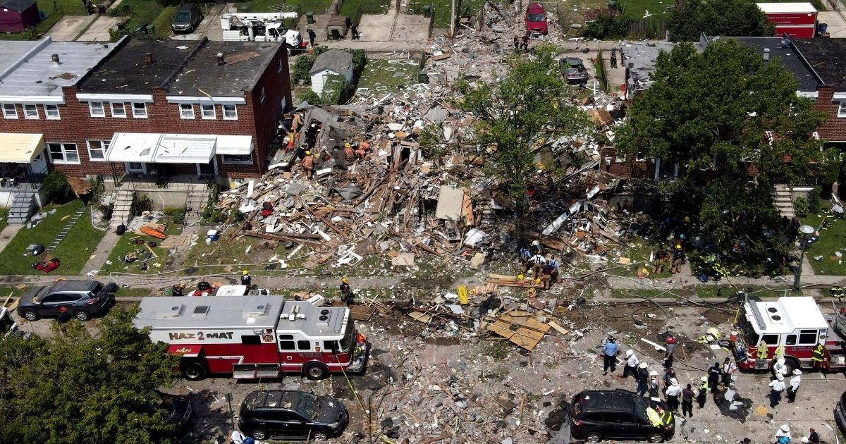 Debris and rubble covers the ground in the aftermath of an explosion in Baltimore on Aug. 10, 2020.