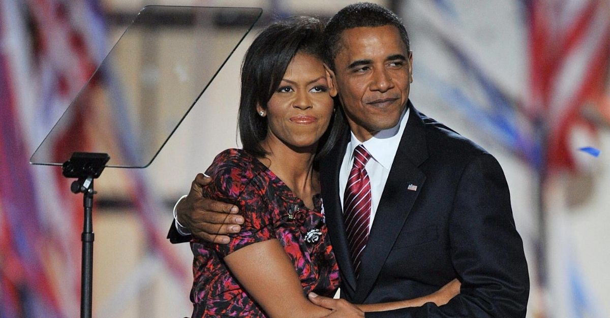 Barack Obama hugs Michelle Obama on stage at the Democratic National Convention 2008 on Aug. 28, 2008.